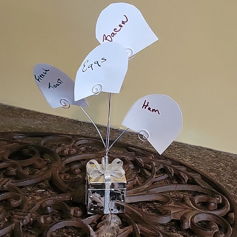 Decorative silver metal holder for cards, Brunch tags, or pictures